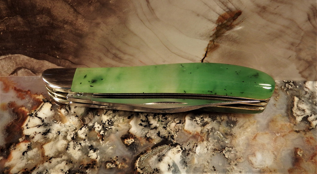 Ogden Jade Knife by Michael Hoover with a glossy green jade handle and folded blades