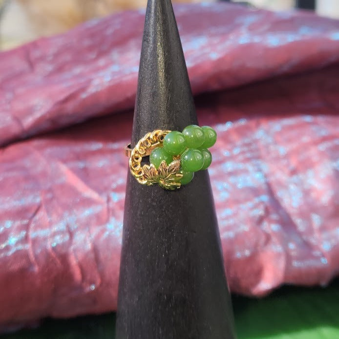 Vintage Jade Grape Ring featuring a cluster of green jade beads in a gold vine setting