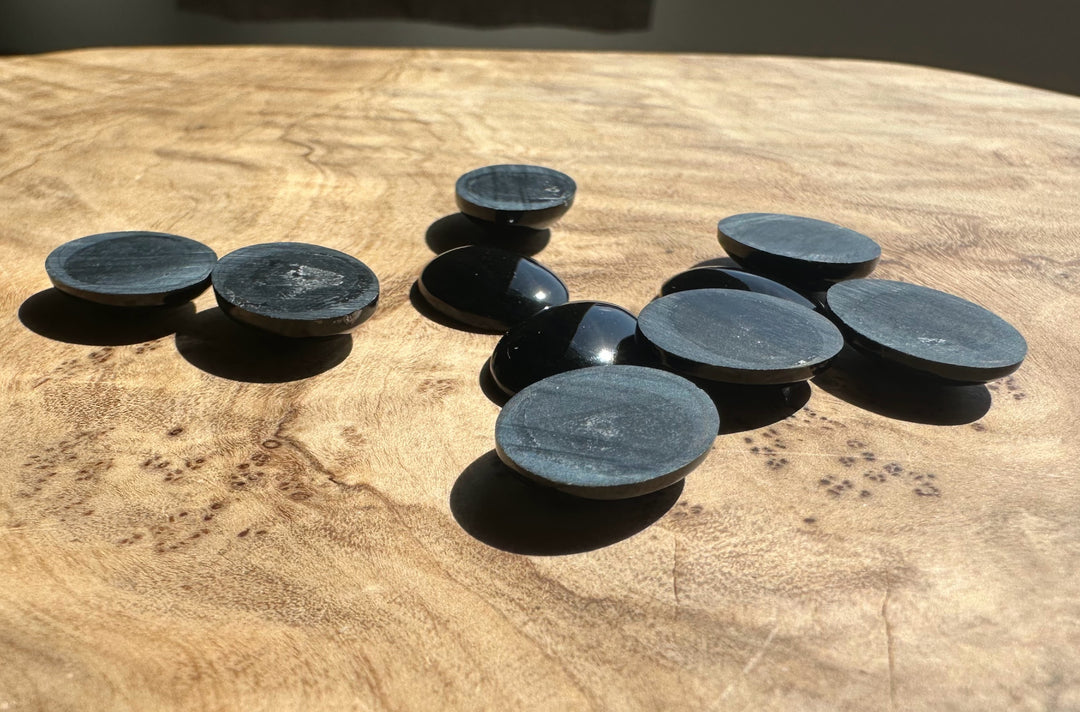 black jade on a wooden surface