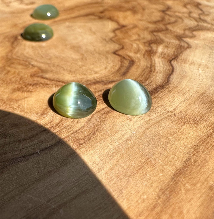 stones on a wooden surface