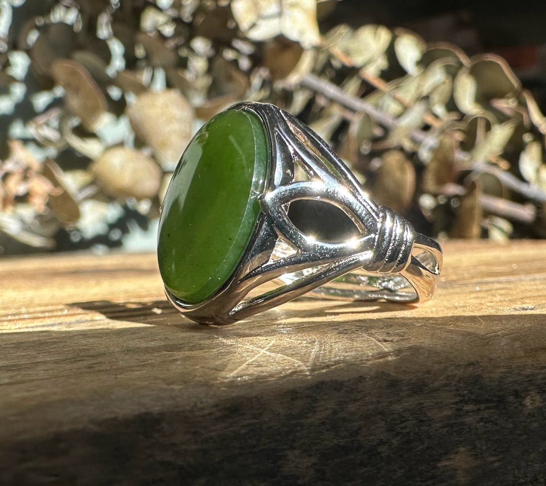 Side view of Canadian Jade Silver Ring showing the twisted silver shank and oval green jade centerpiece