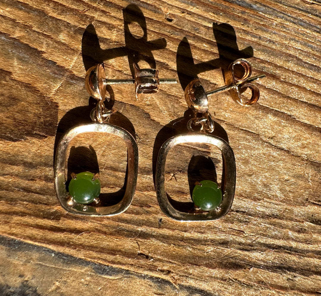 Vintage jade earrings with square open frames and green round jade stones set in silver-tone metal