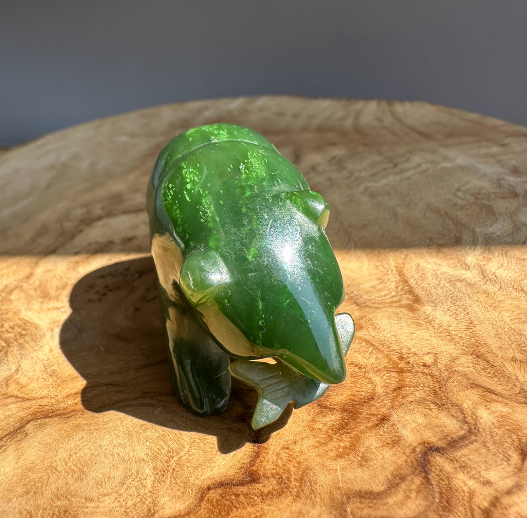 Bear Special with Jade Fish green jade bear with a small jade fish on its back viewed from the side