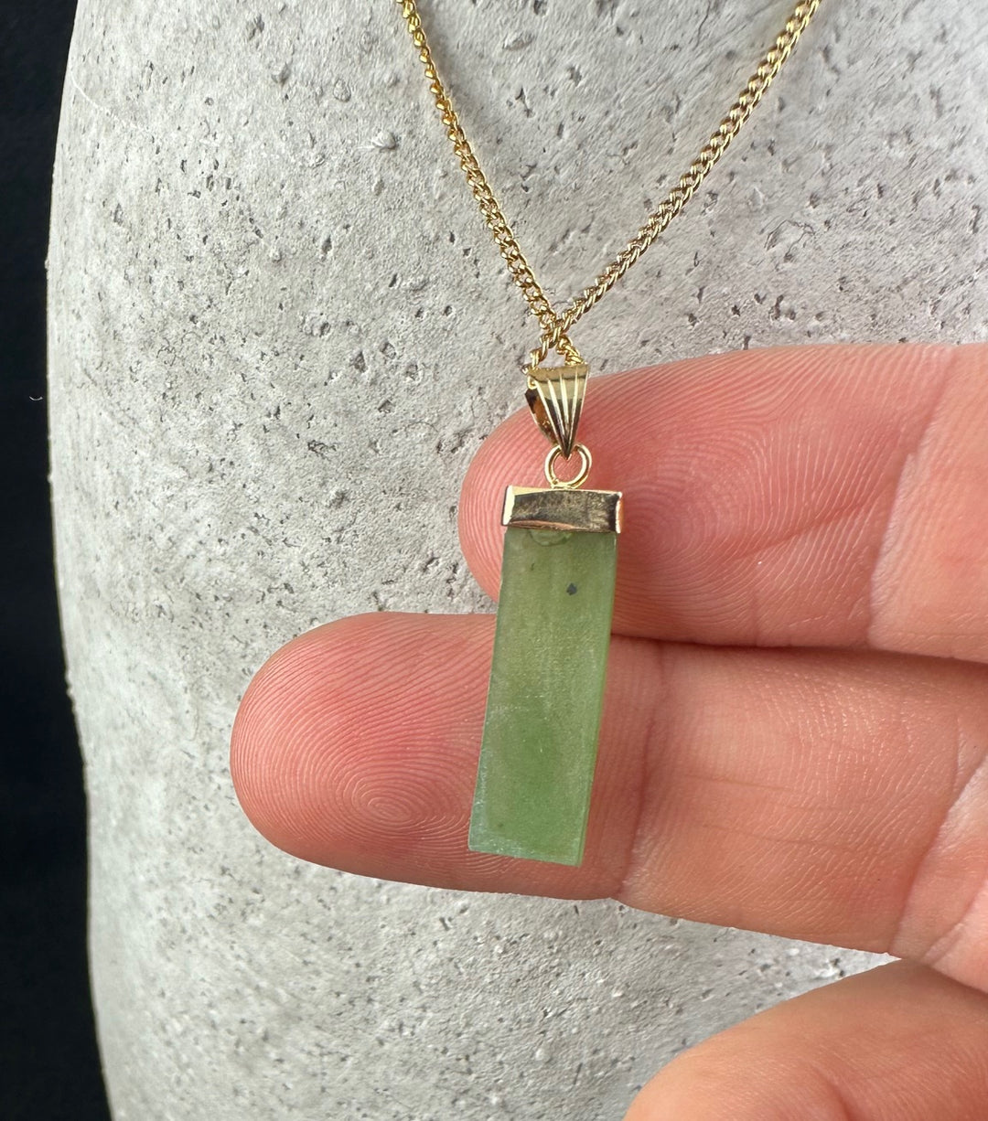 Vintage Rectangle Drop Pendant 30mm with pale green rectangle and gold bail on a gold chain close up