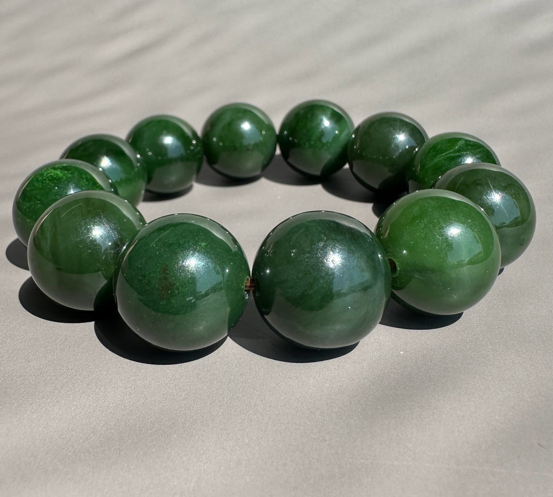 dark green jade on grey background