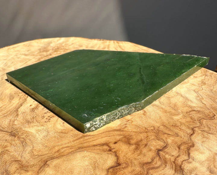 jade slab on wooden base
