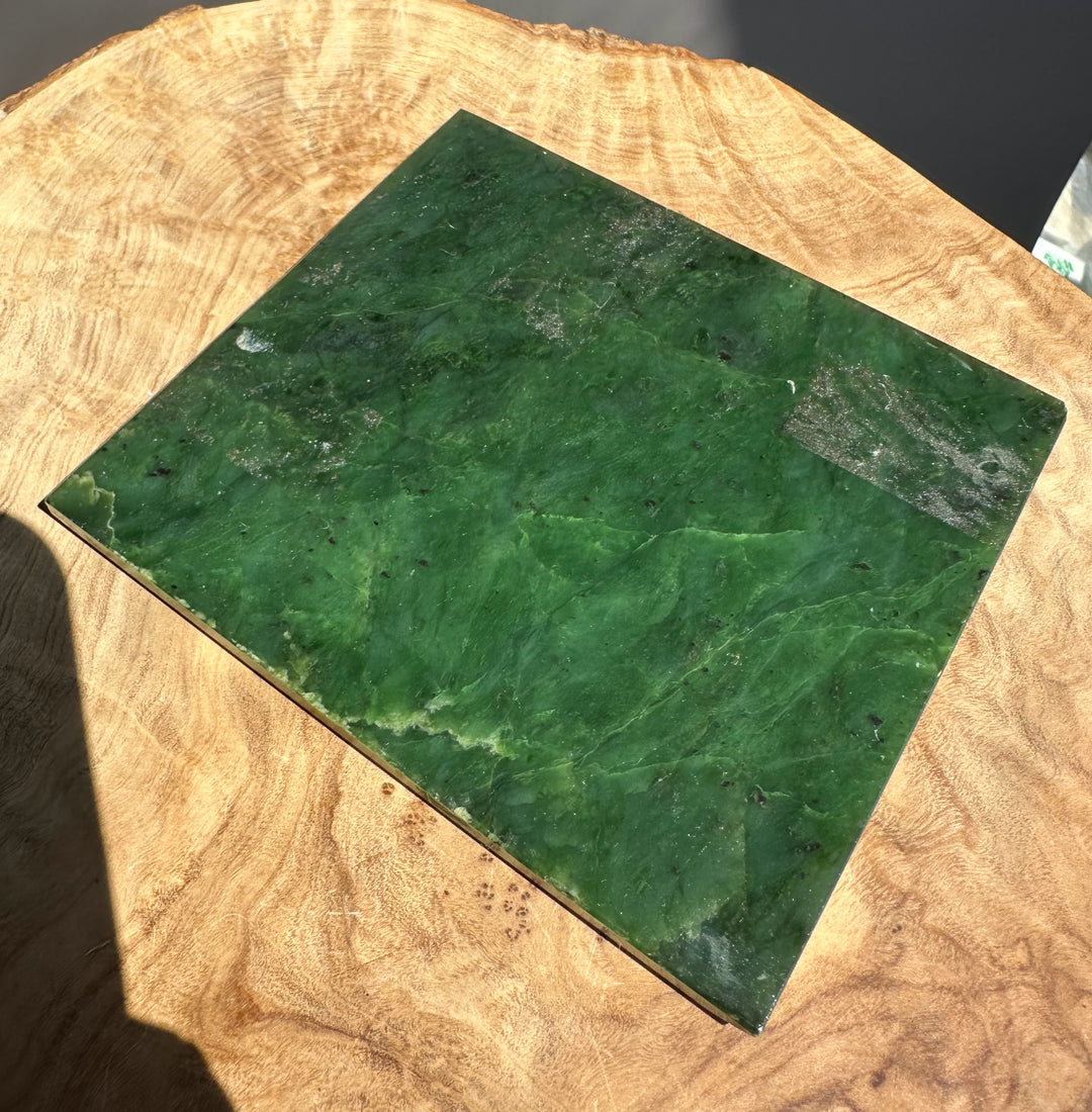 jade slab on wooden base