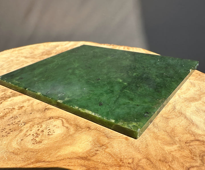 side view of green jade slab