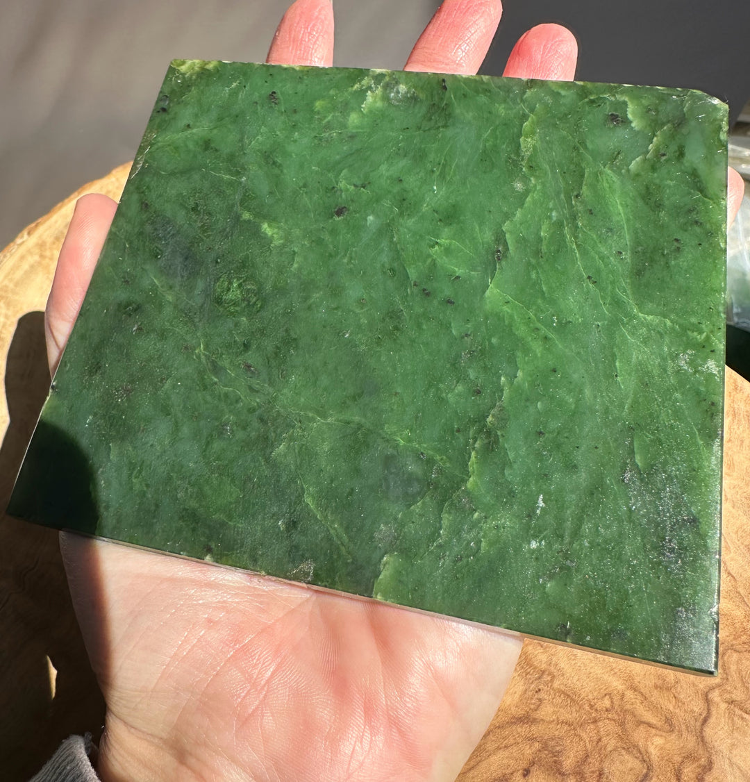 jade slab in someones hand