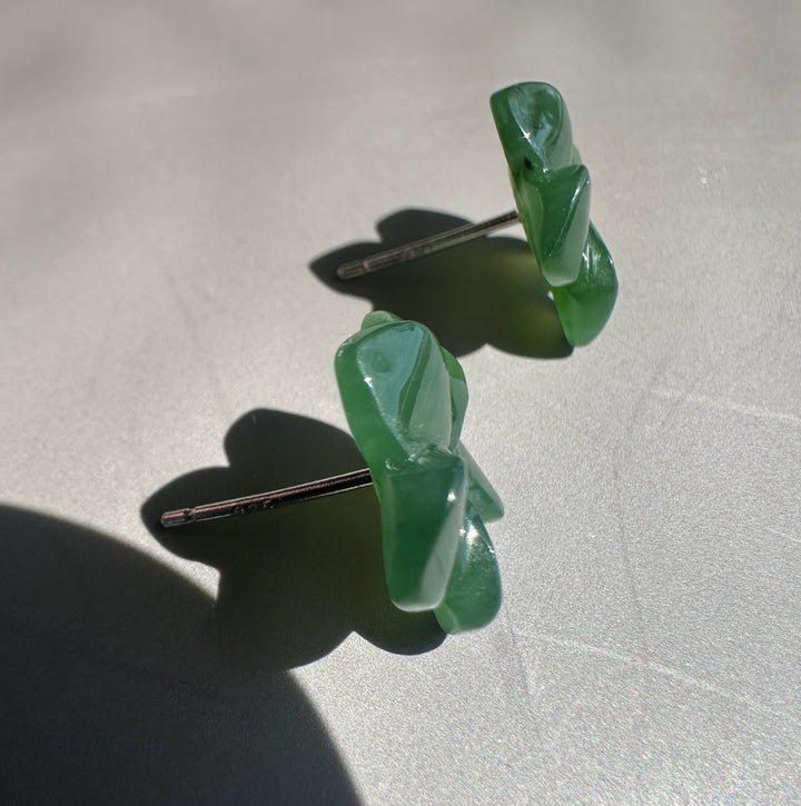side view of jade flower earrings