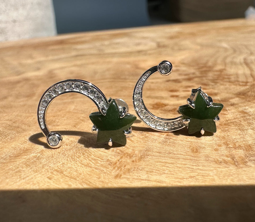Close-up of Silver Star and Moon Studs showing crystal crescents and green star motifs