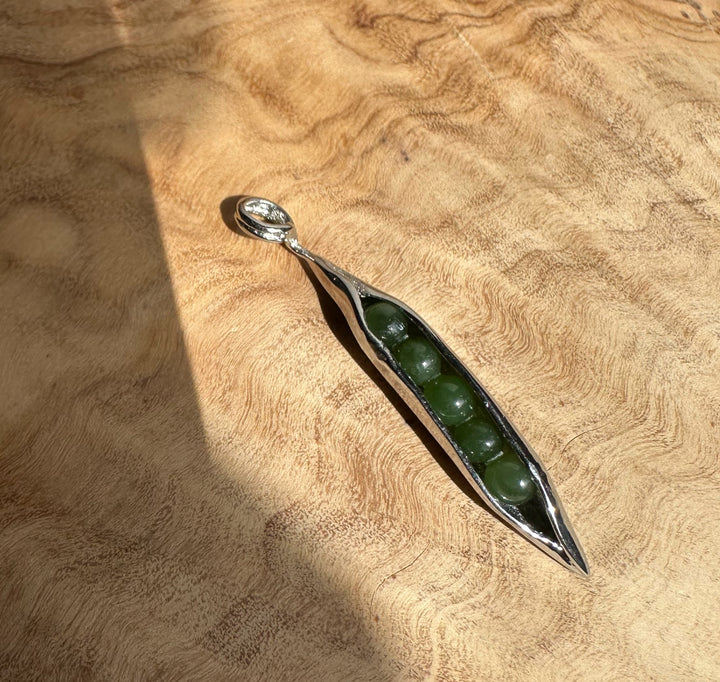 Stainless steel jade peapod pendant with five green beads inside