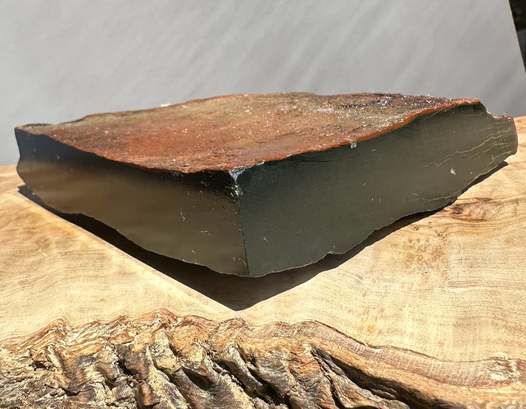 Wyoming slab on a wooden surface with a neutral background