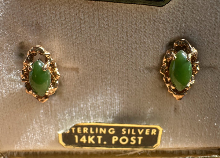 Vintage jade earrings with gold filigree settings displayed in a jewelry box with Genuine Jade 14KT Post label