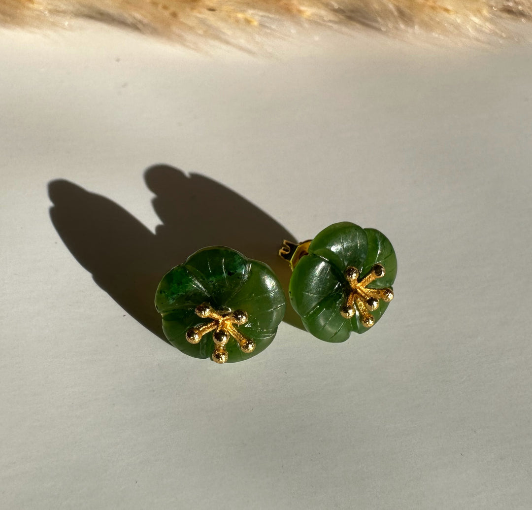 Two green circular jade flower earrings with gold branch center accents