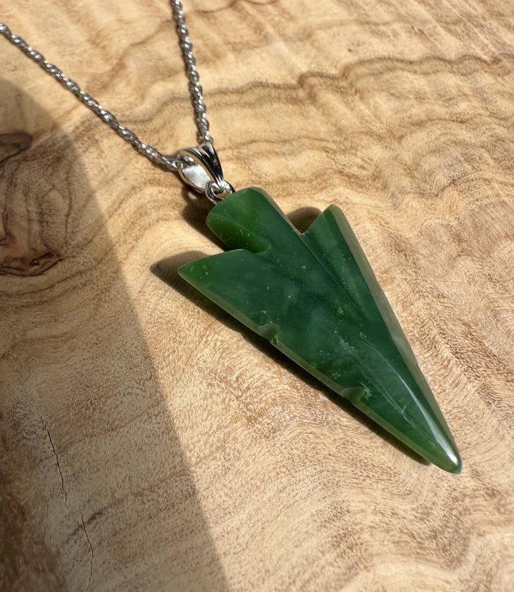 Canadian Jade Arrow Pendant 31mm hanging from a silver chain