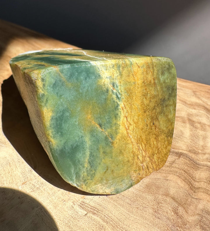 jade on a wooden surface