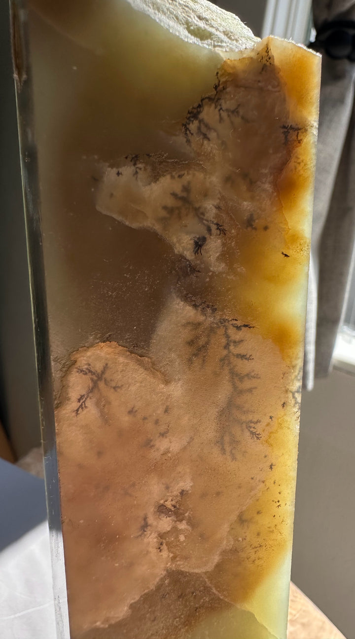 Close-up of a translucent jade stone with natural patterns