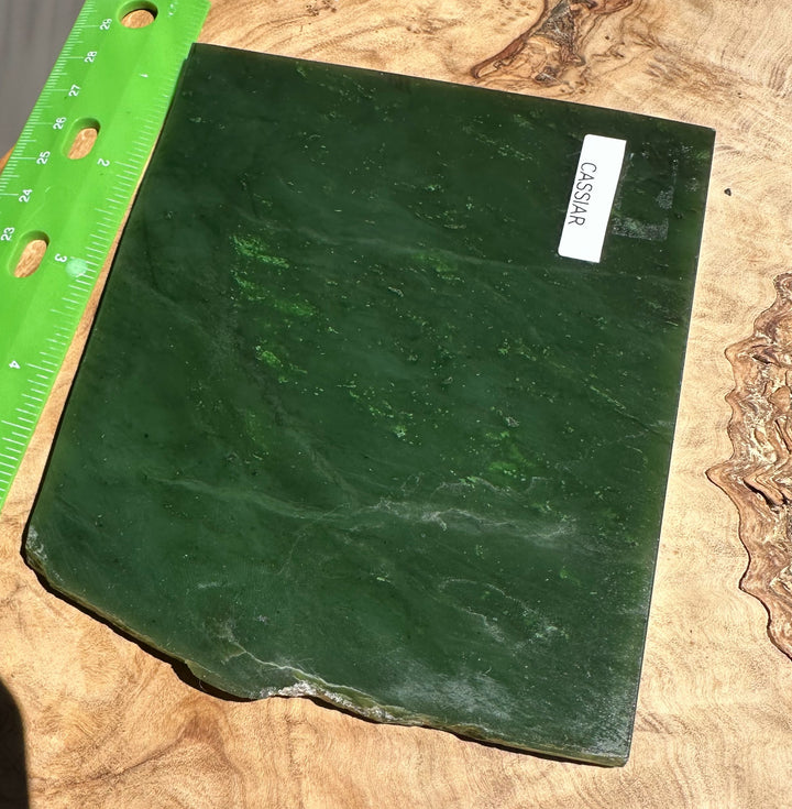 A Grade Canadian Jade Slab 240g with Cassiar label photographed beside a green ruler along the slab&