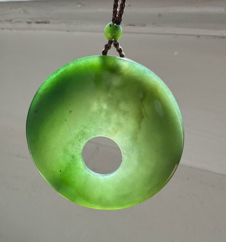 green jade against grey background