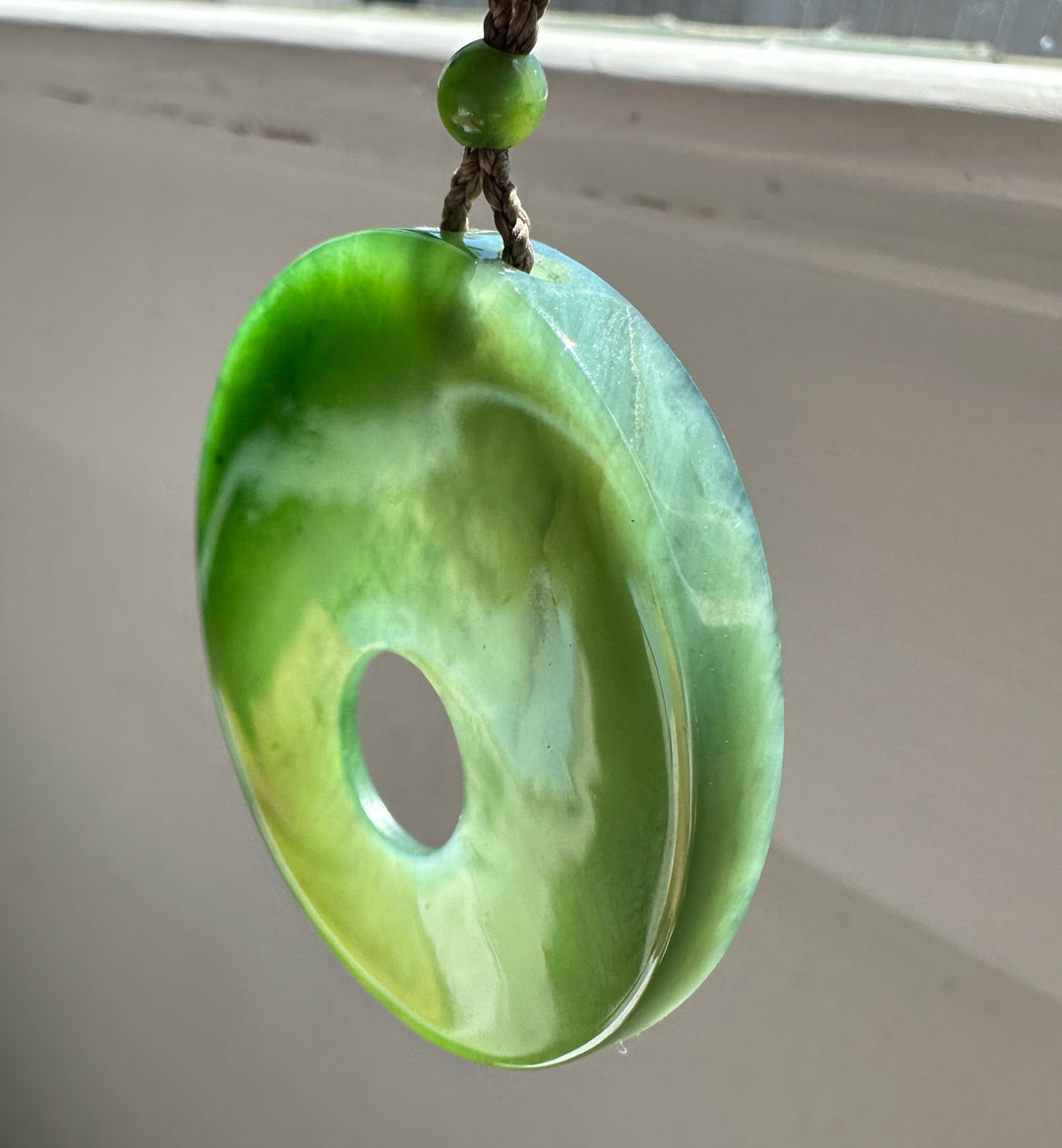 green jade on grey background