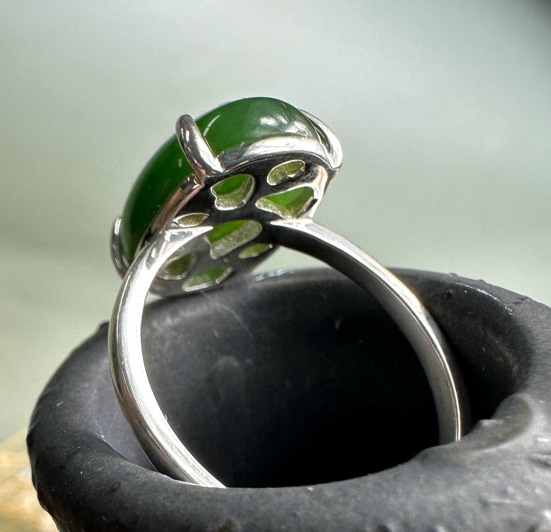 Front view of Canadian Jade and Silver Ring showcasing a green oval jade held by silver prongs.