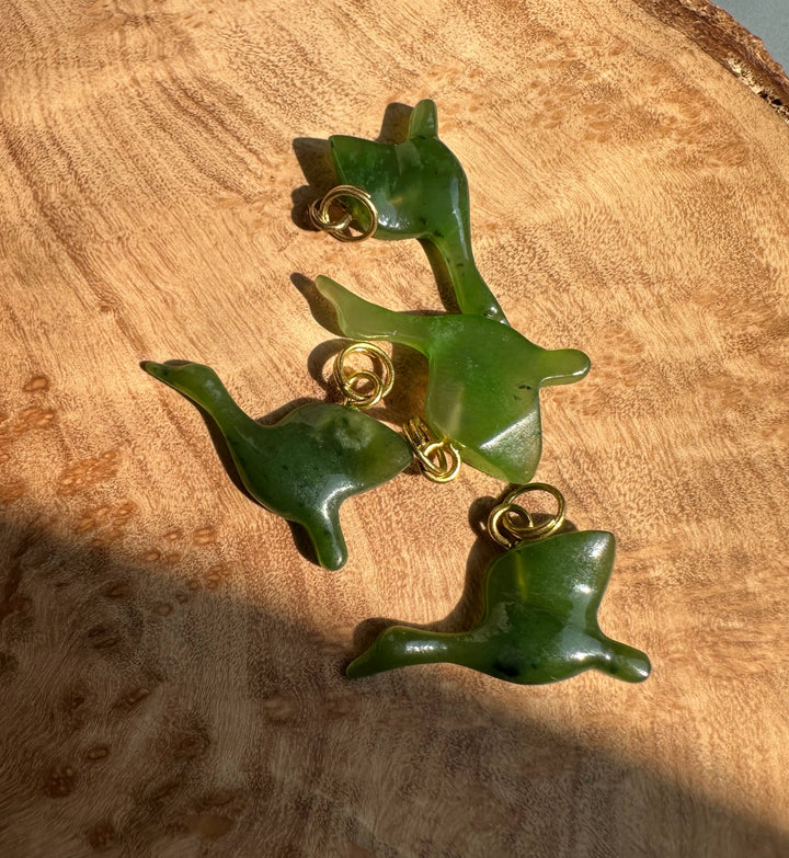 Green jade goose charms connected by gold loops