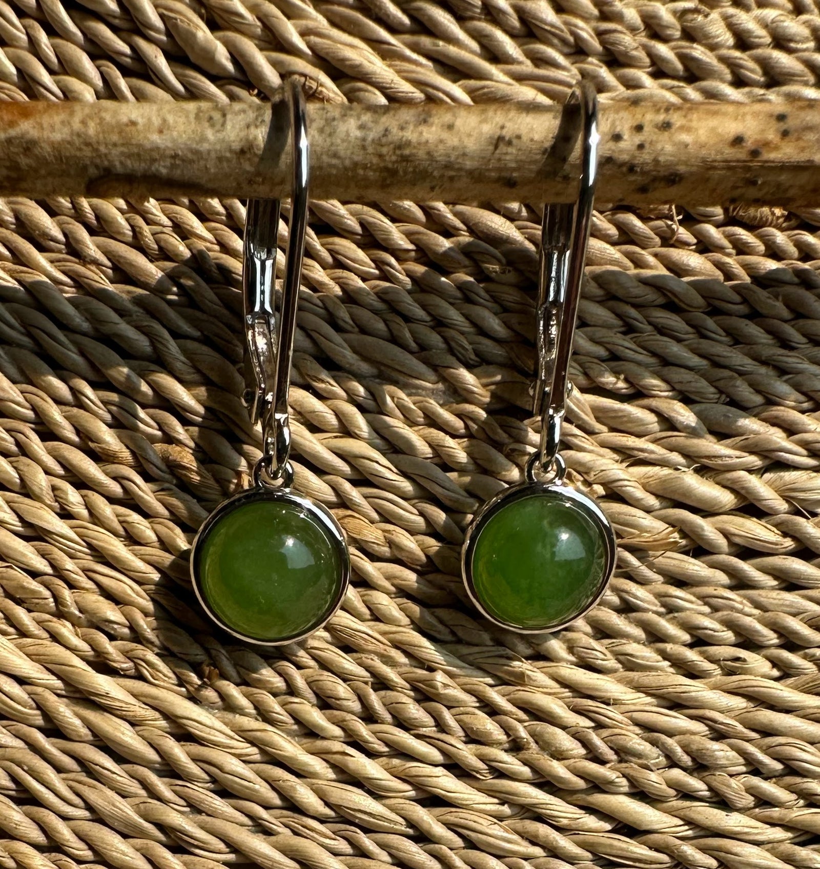 Jade round leverback earrings 6mm with green cabochon set in a silver bezel.