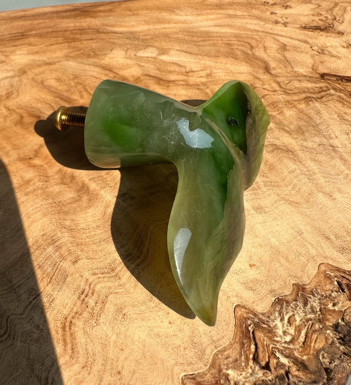Polar Jade Whale Drawer Pull in green jade with a brass mounting screw