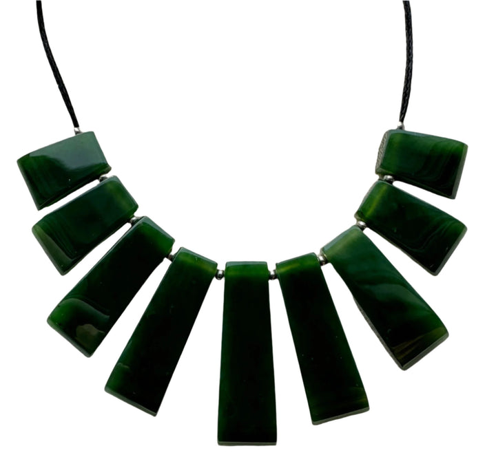 Jade necklace with rectangular green beads on a black cord
