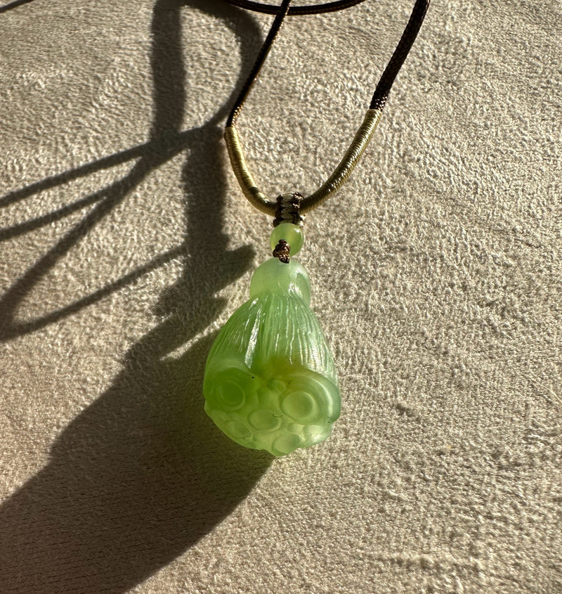 Siberian Jade pendant in the shape of a lotus seed pod*