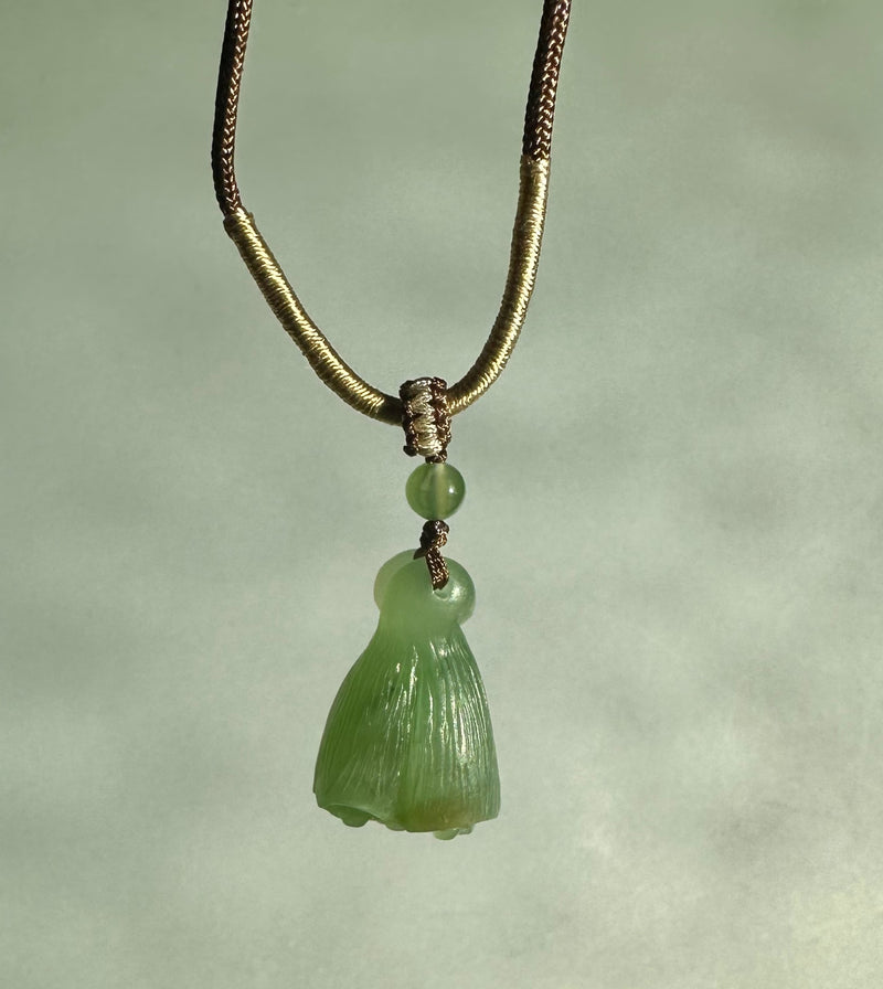 Siberian Jade pendant in the shape of a lotus seed pod*