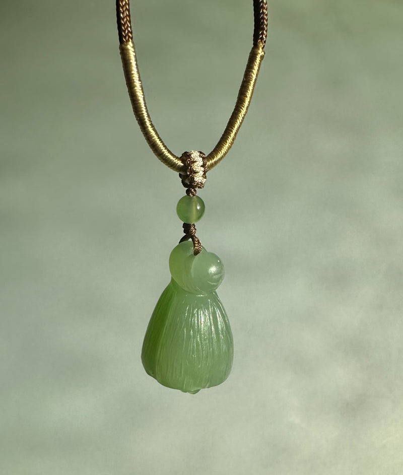 Siberian Jade pendant in the shape of a lotus seed pod*