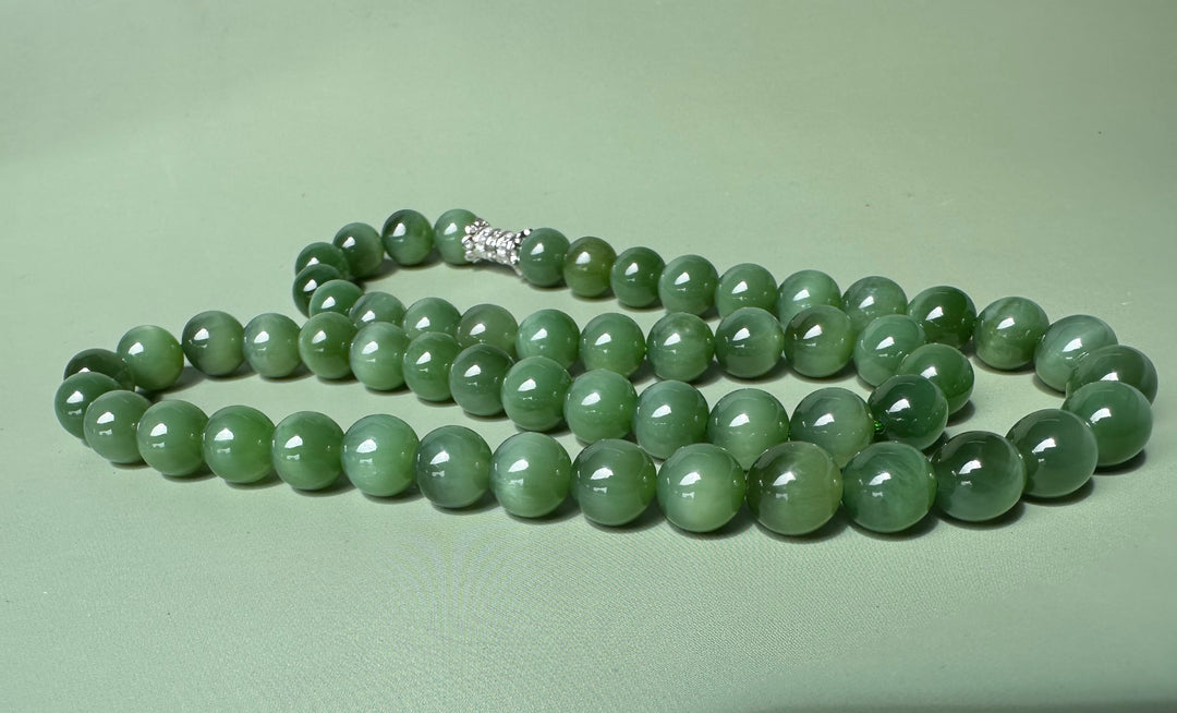 8mm chatoyant Siberian beads bracelet with a silver spacer clasp