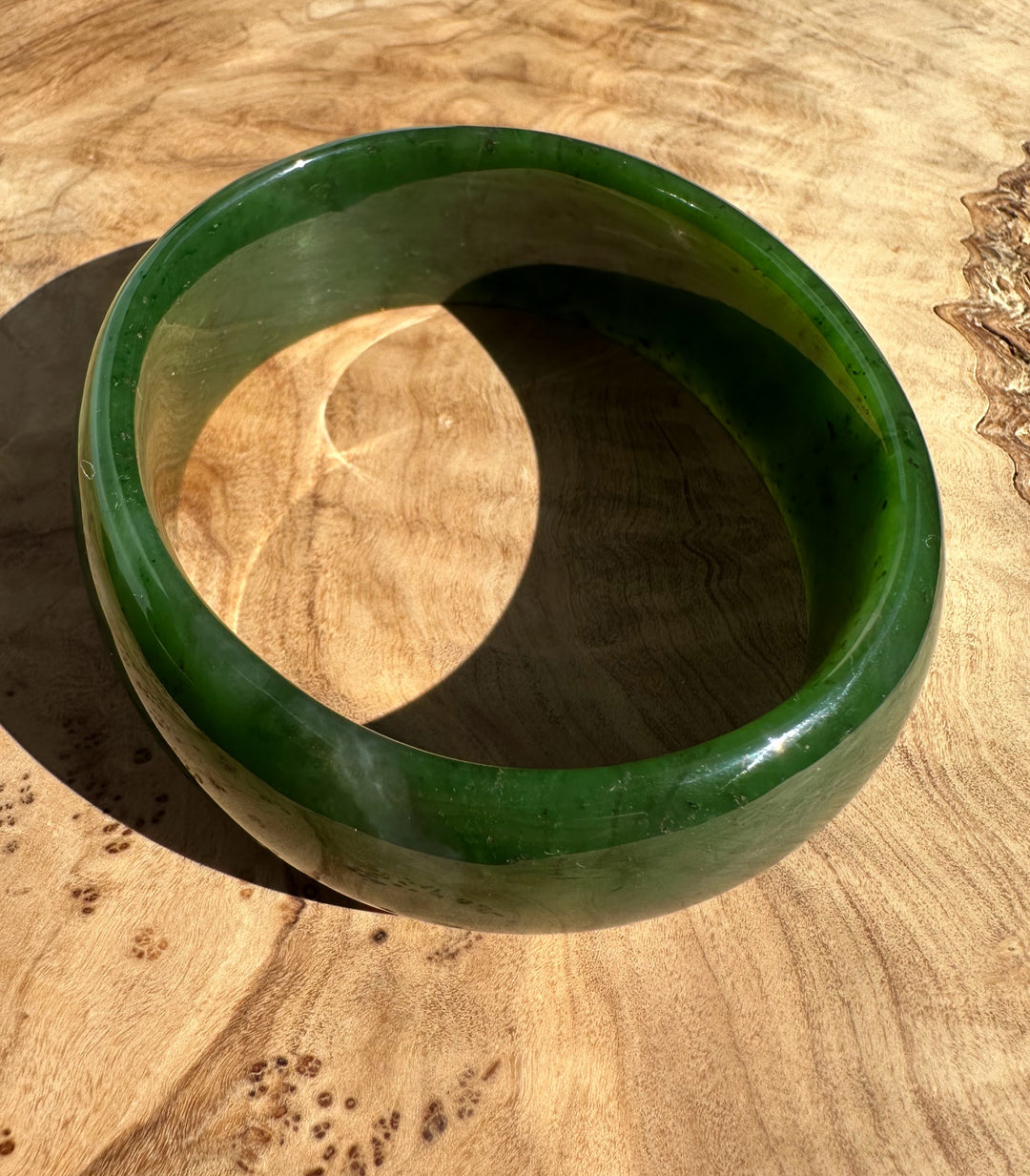 Inside view of the Canadian nephrite jade oval bangle showing the hollow center and thick band