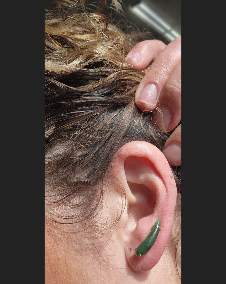 Canadian jade ear climber earring in sterling silver worn on the ear