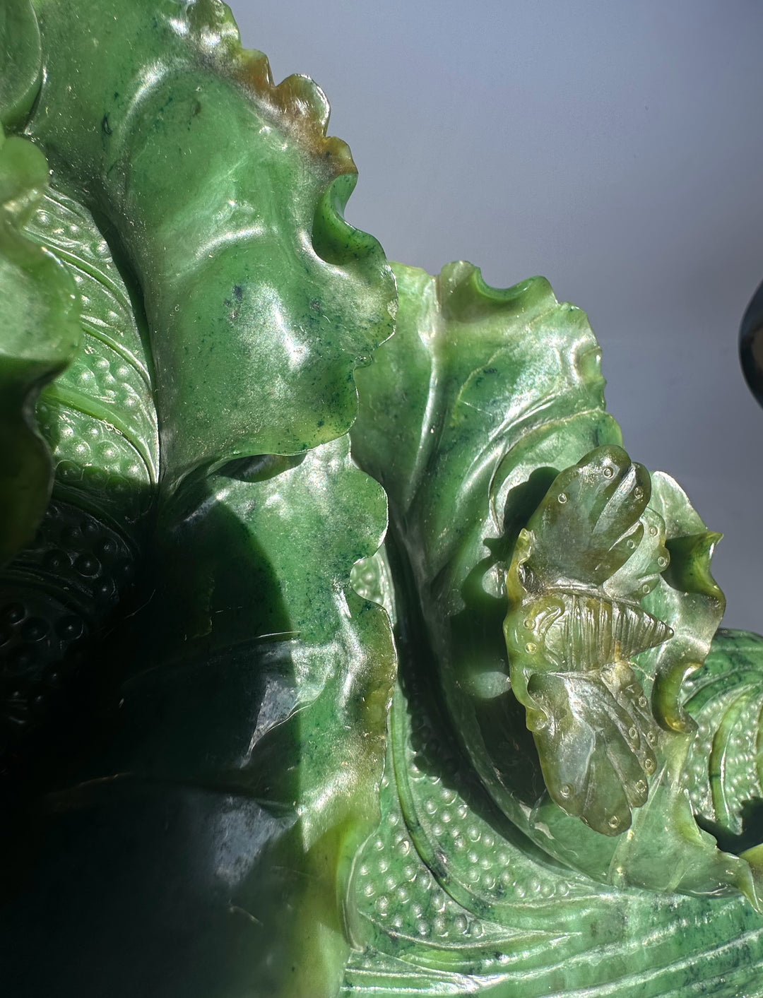 Close-up of a large Canadian jade Chinese cabbage carving showing textured leafy leaves.