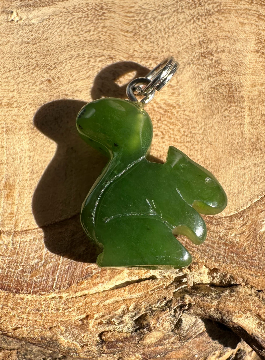 Green jade squirrel charm pendant with metal loop for a necklace