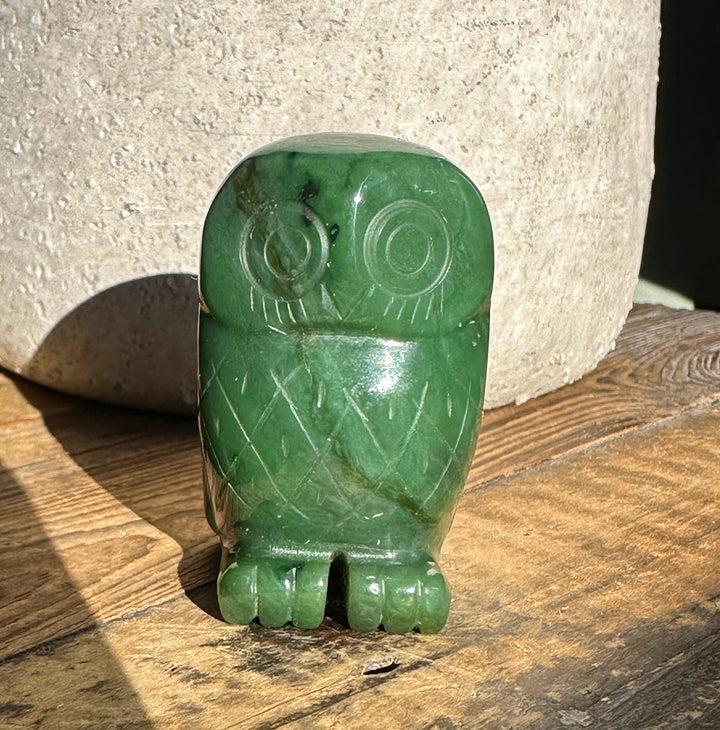 Green jade owl figurine carved from Canadian jade