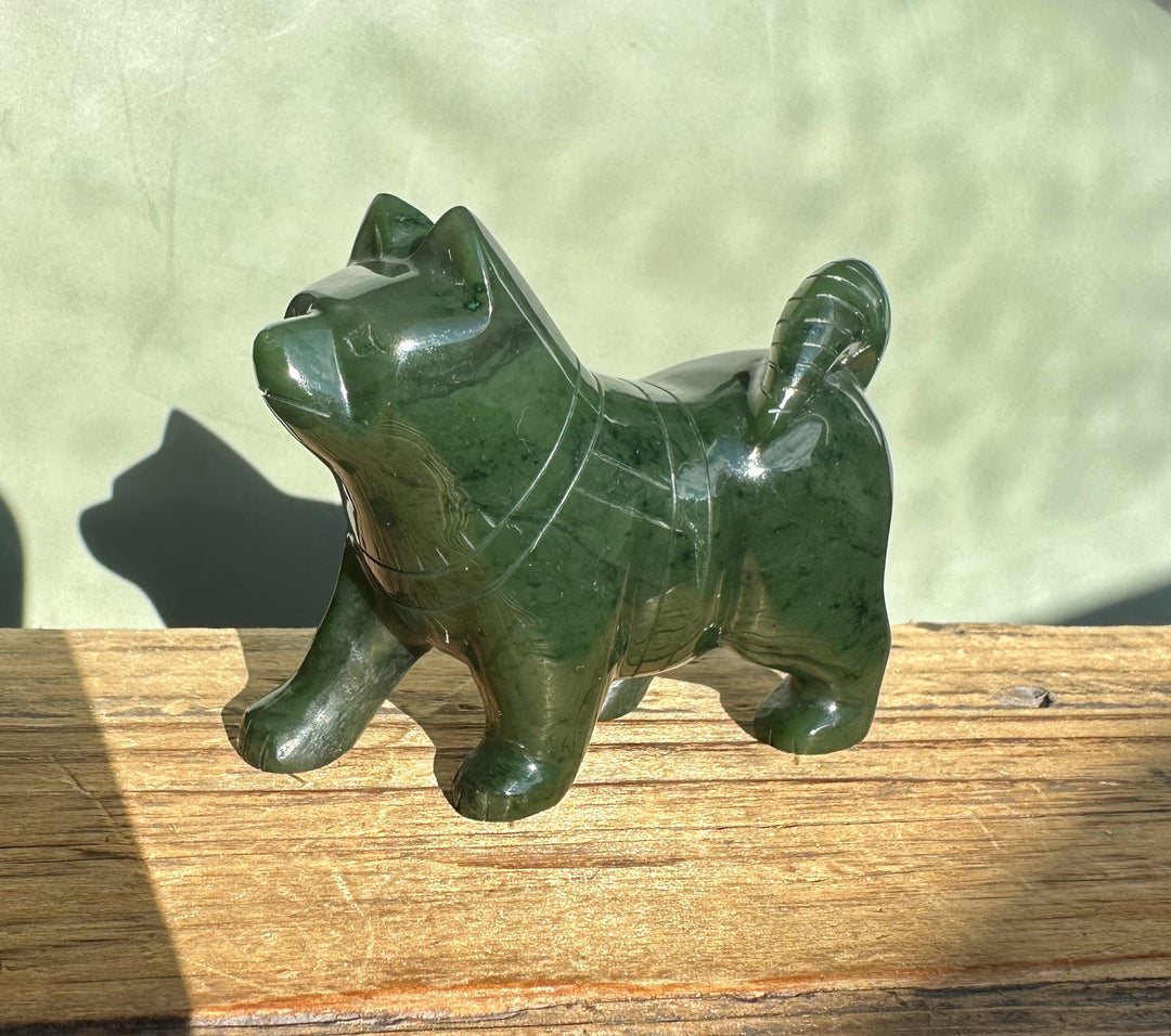 Canadian Jade Dog husky figurine carved from dark green jade, a 3-inch statue.