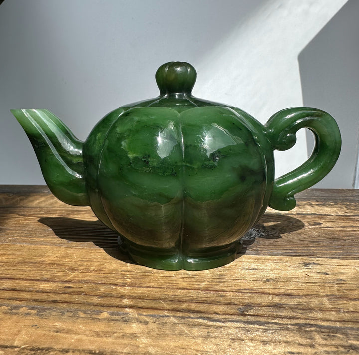 Polar Jade Teapot 6 inch side view with glossy green glaze, bulbous body, curved spout on the left, and decorative handle.