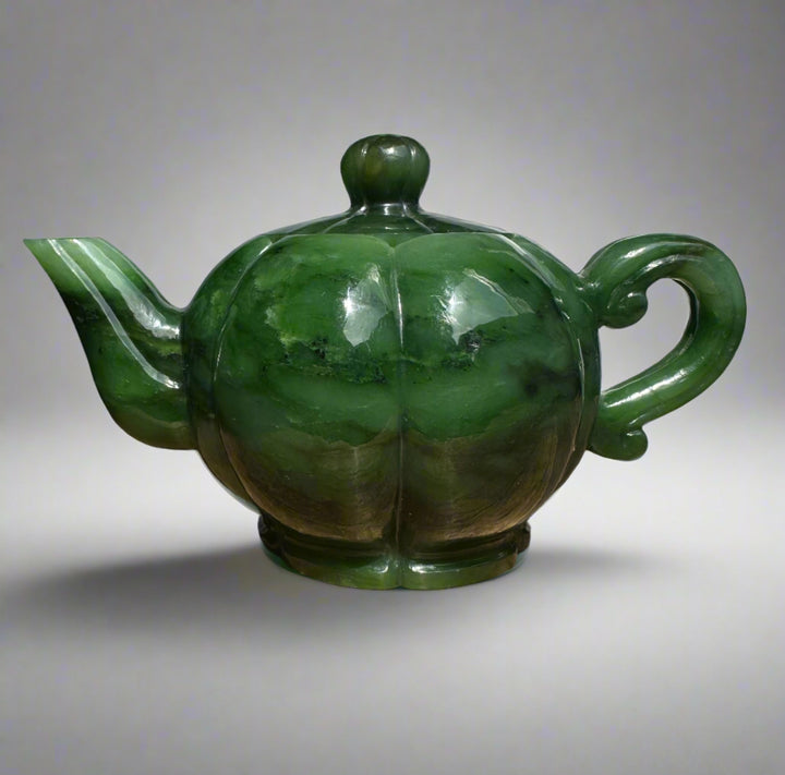 Polar Jade Teapot 6 inch with a glossy green jade finish, bulbous body, curved spout on the left, and rounded handle on the right, lid with knob.