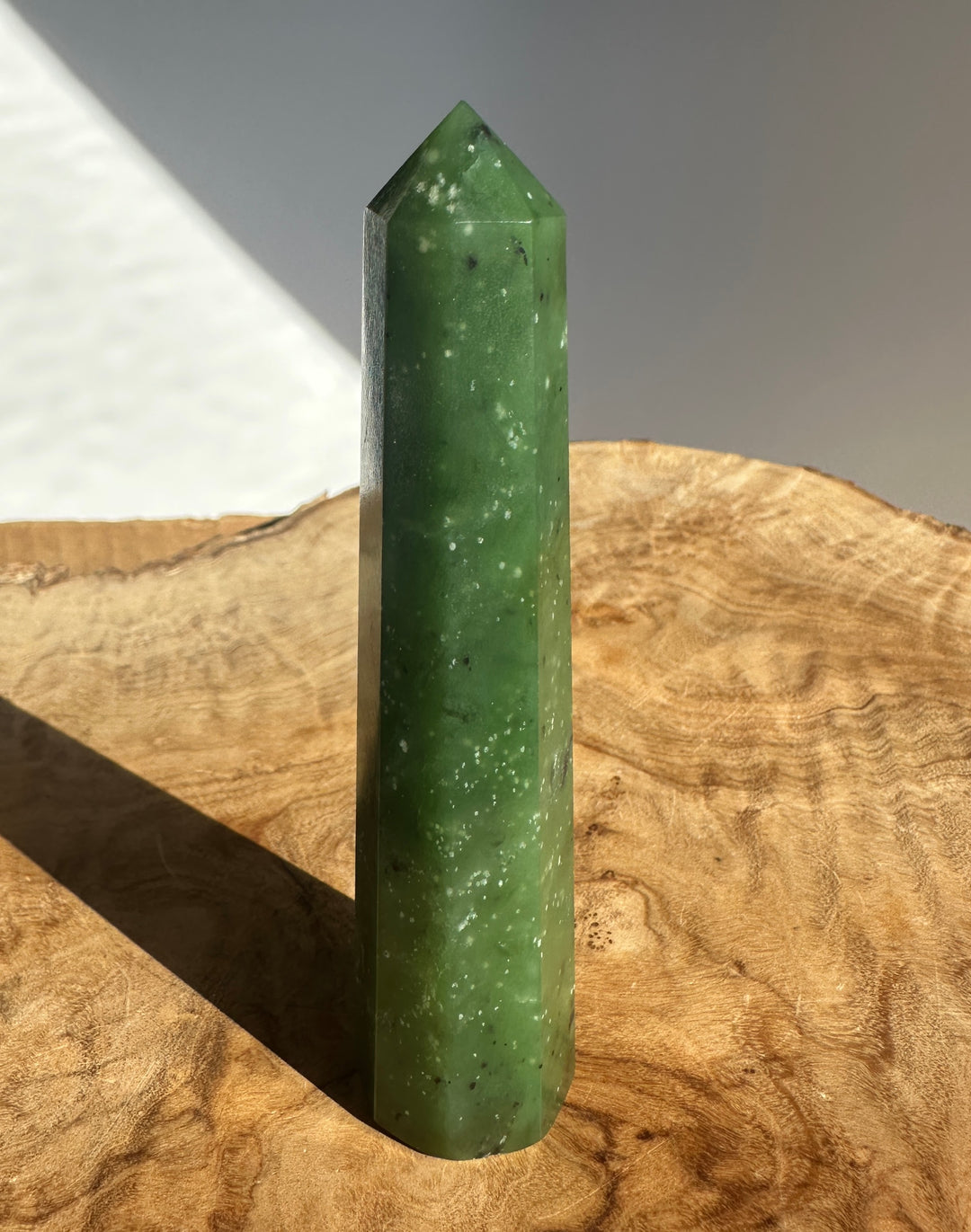 Close up of the Canadian Ogden Jade 4.25 inch tower being held between fingers.