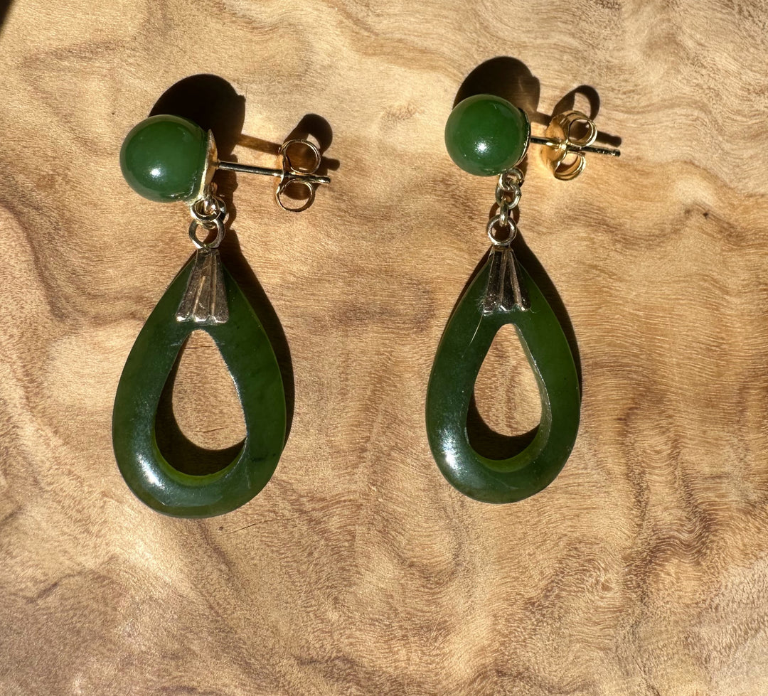 Pair of green jade drop earrings featuring round studs and matching open teardrop pendants