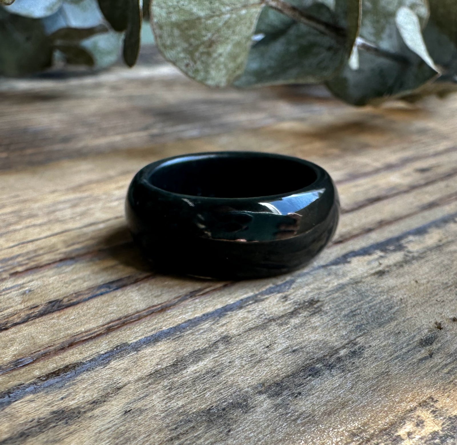 Dark green nephrite jade wide band ring with a glossy finish in sizes 7 and 8