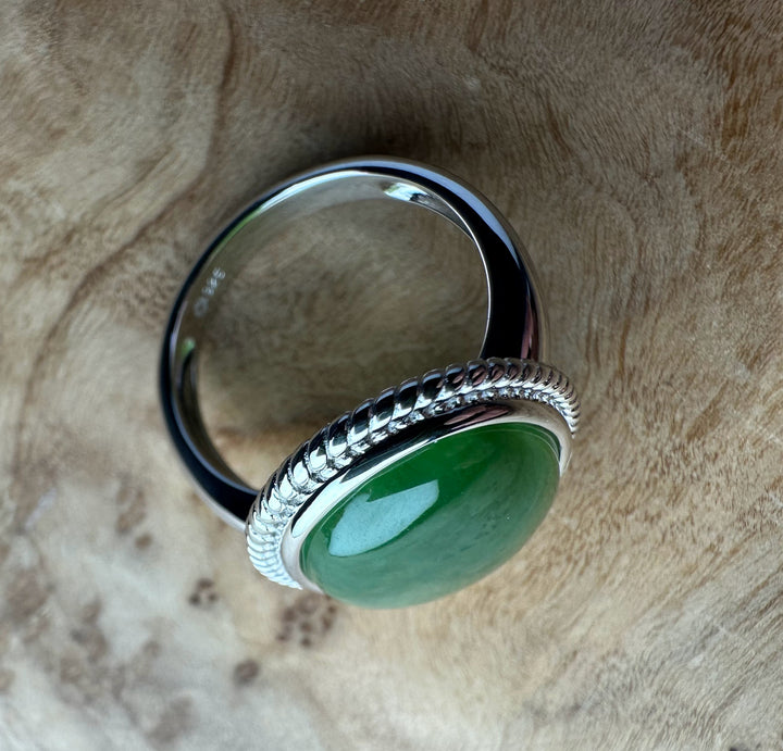 Profile view of Canadian Jade Silver Ring showing a green jade cabochon in a rope-bordered bezel