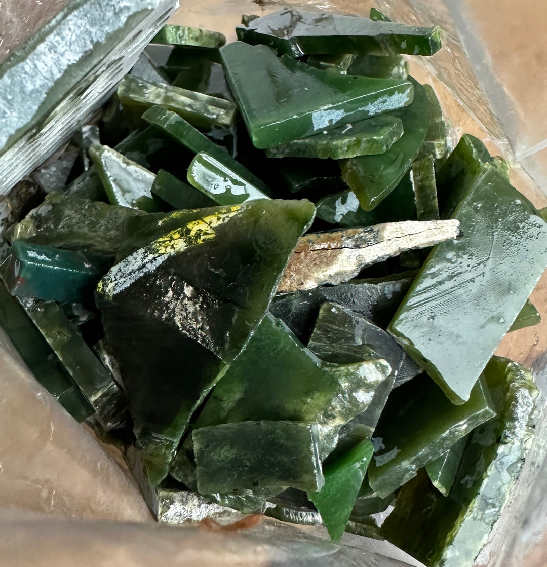 jade with oil on it to show the green