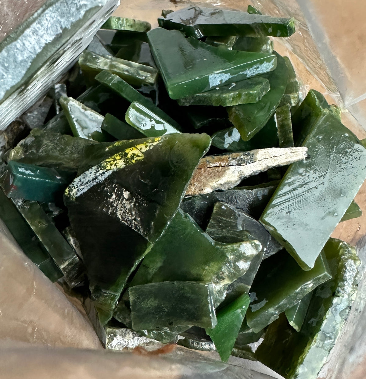 jade with oil on it to show the green