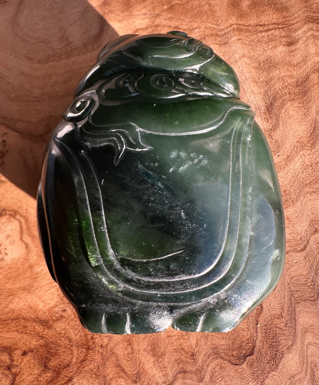 Dark green jade carving of a young boy riding an elephant 2.75 inches