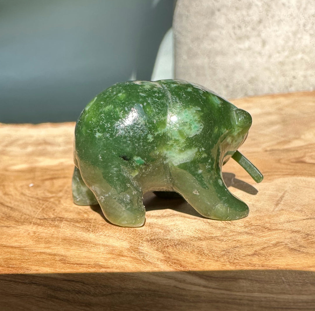 Bear Special green jade bear with a jade fish accessory.